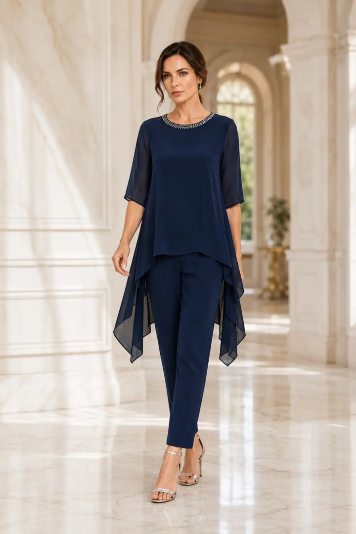 Completo In Chiffon A Strati Con Mantellina E Pantaloni A Gamba Larga