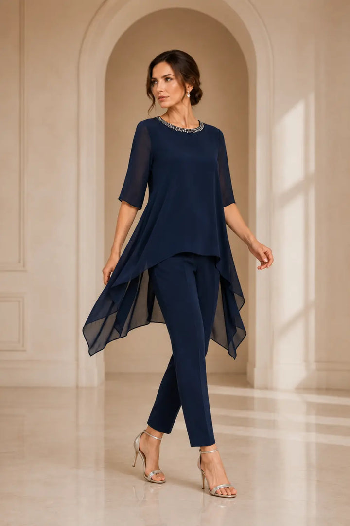 Completo In Chiffon A Strati Con Mantellina E Pantaloni A Gamba Larga