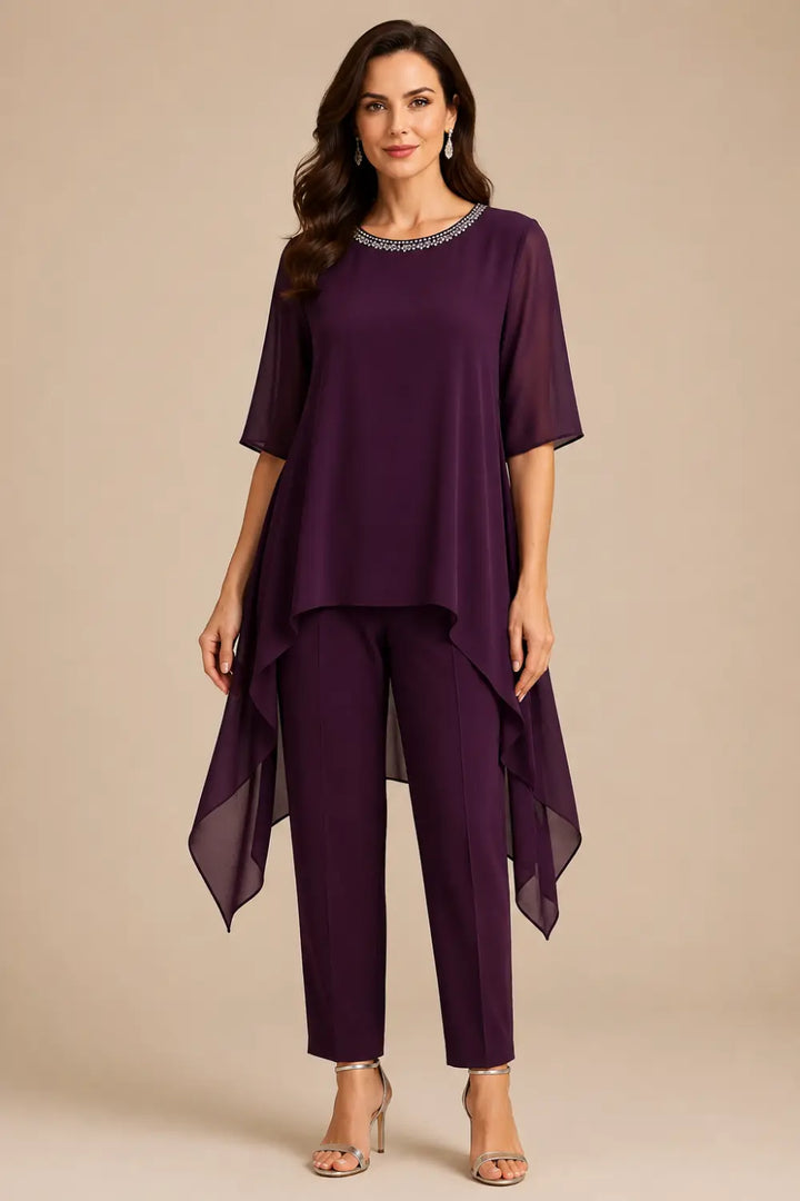Completo In Chiffon A Strati Con Mantellina E Pantaloni A Gamba Larga